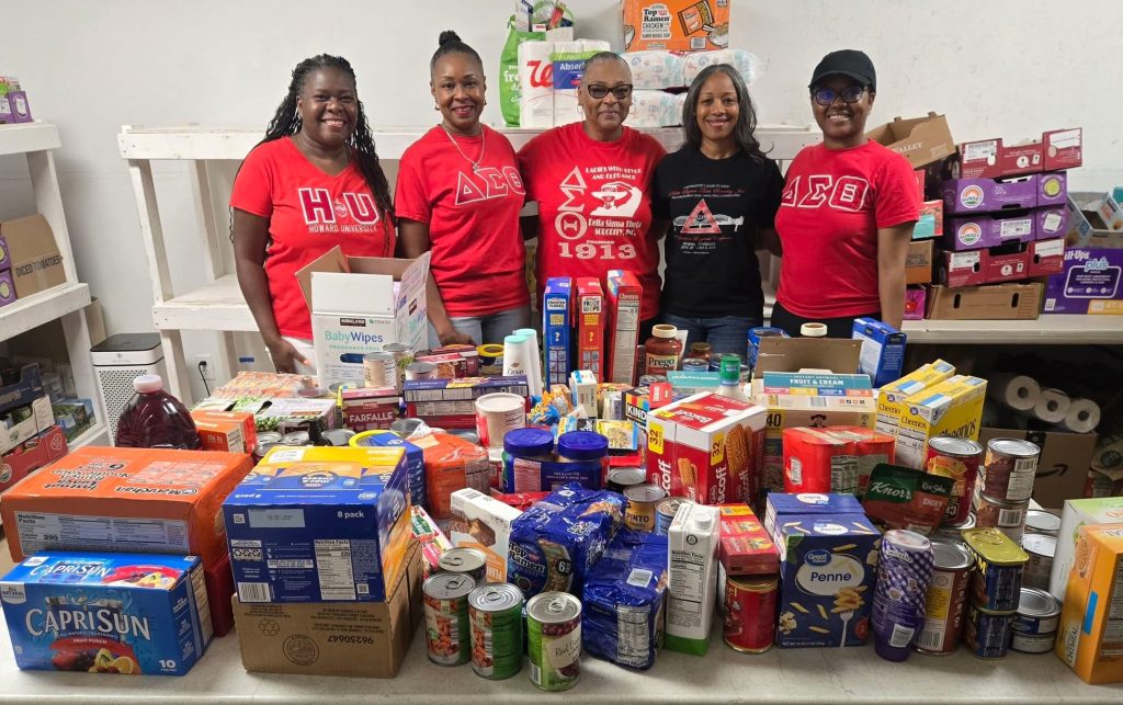 Volunteers sorting and distributing food at a Columbia Community Care site in Howard County