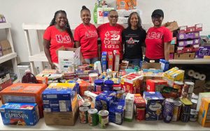 Volunteers sorting and distributing food at a Columbia Community Care site in Howard County